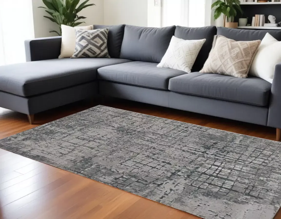 10′ X 13′ Gray and Ivory Abstract Area Rug