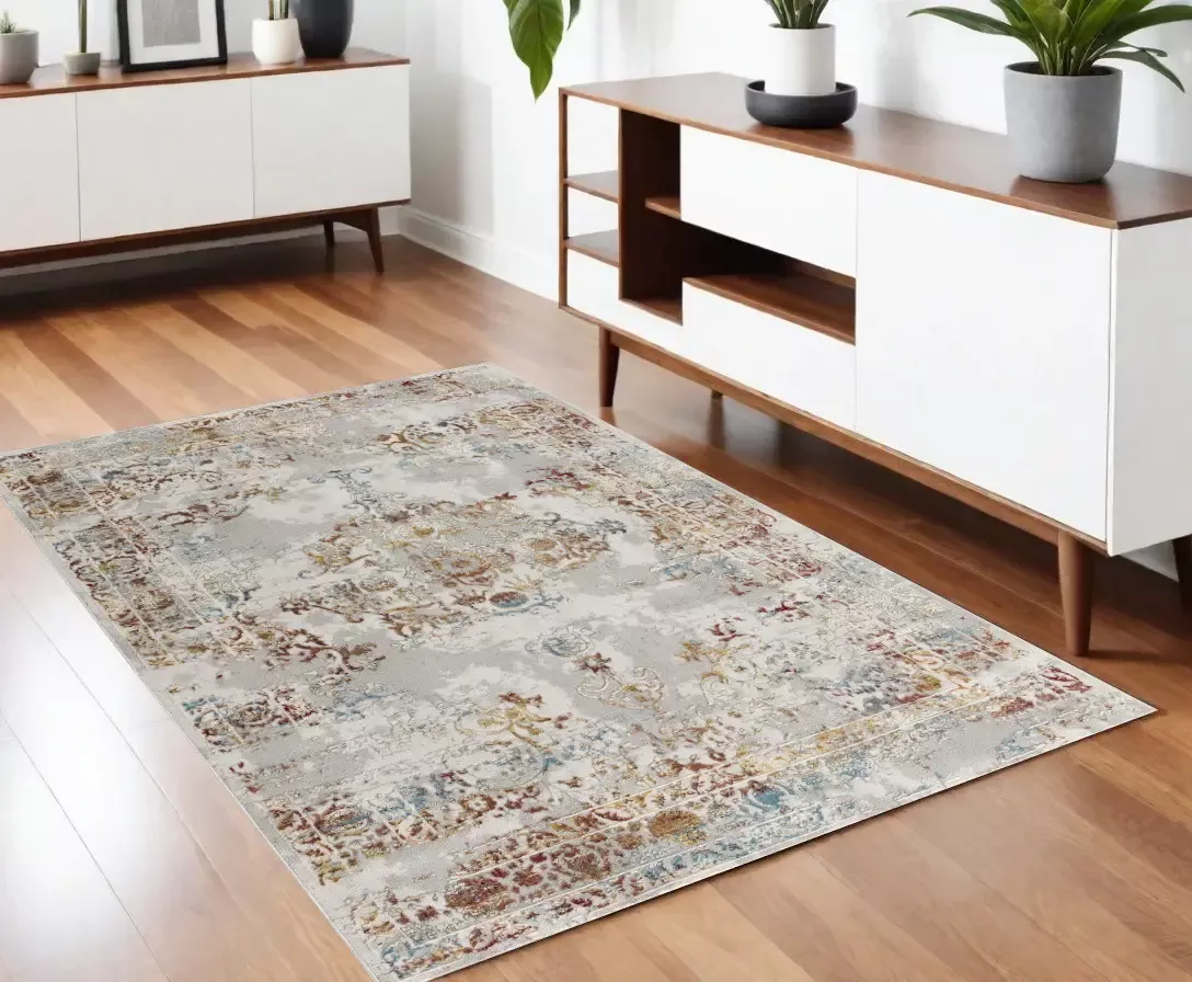 4' X 6' Gray And Beige Distressed Ornate Area Rug