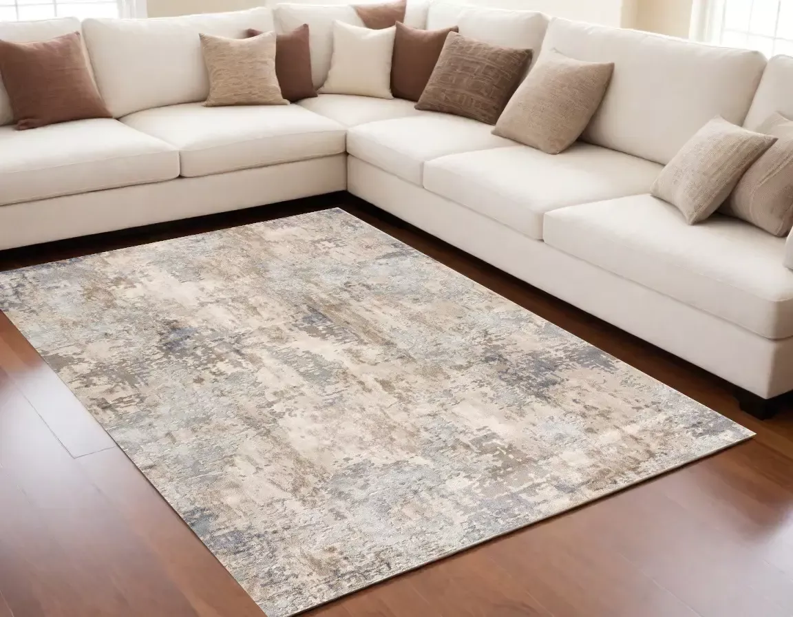 5' X 8' Beige And Ivory Abstract Area Rug